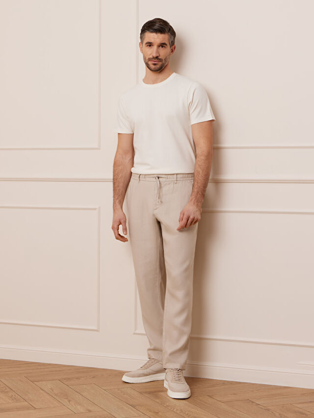 BEŻOWE SPODNIE CANEY